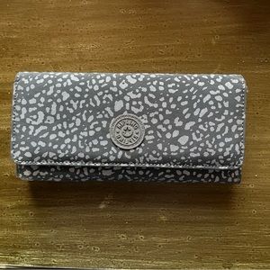 SOLD. grey Kipling money wallet.